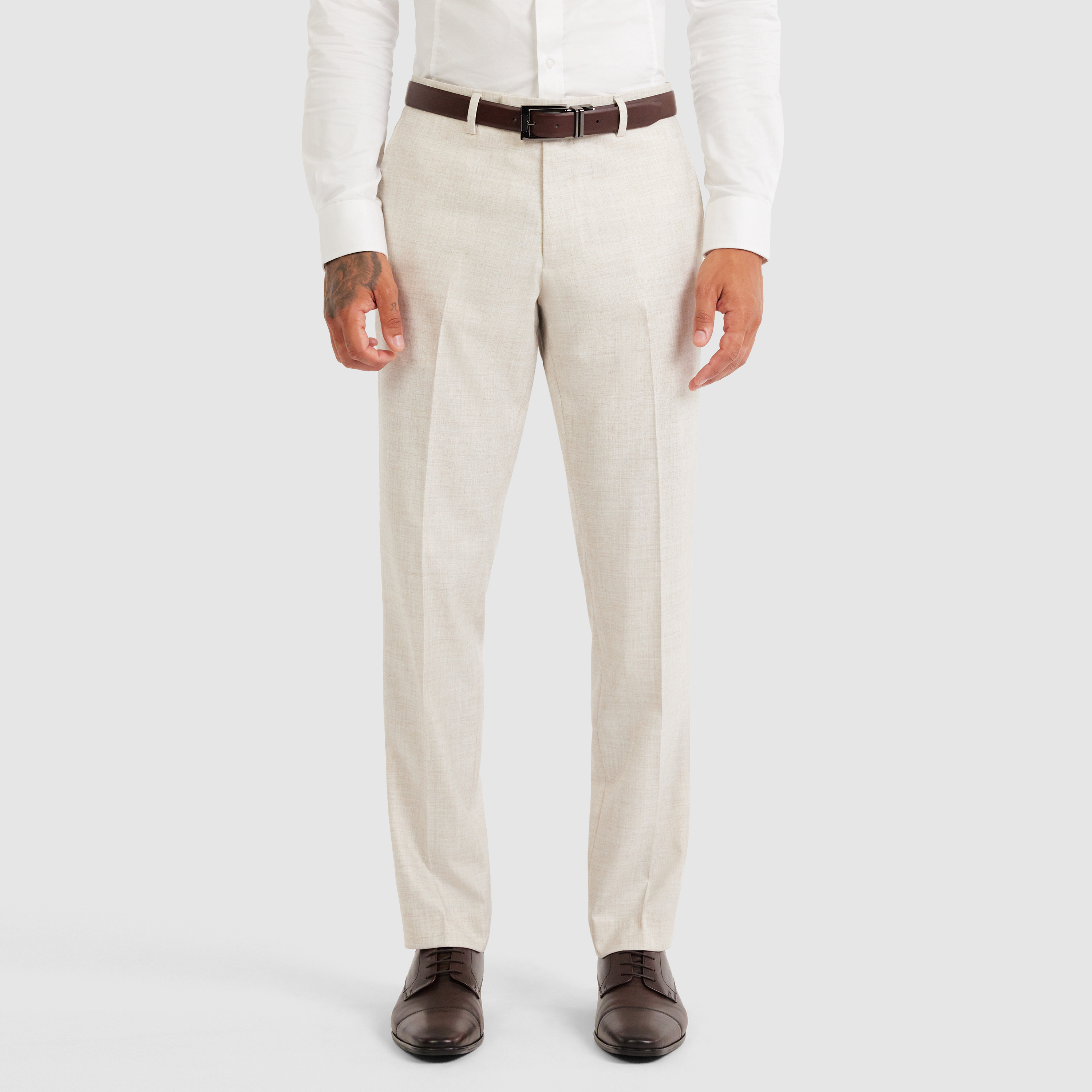 a man wearing a white shirt and brown pants Stock Photo by Icons8 |  PhotoDune